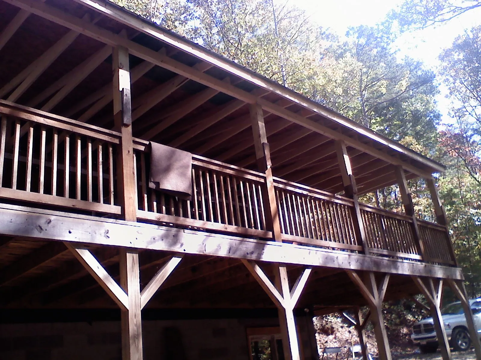 Timber framing under a new elevated porch and deck — Roof Leak Repair in Roslyn Heights by Roofing Brothers